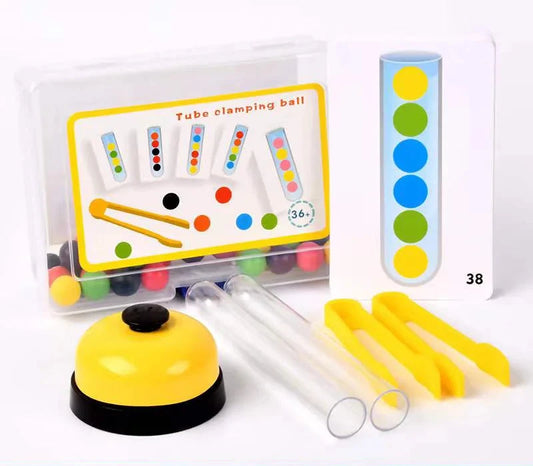 Jeu éducatif Montessori avec tubes à essais et billes colorées